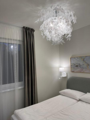 Apartamentai su baseinu